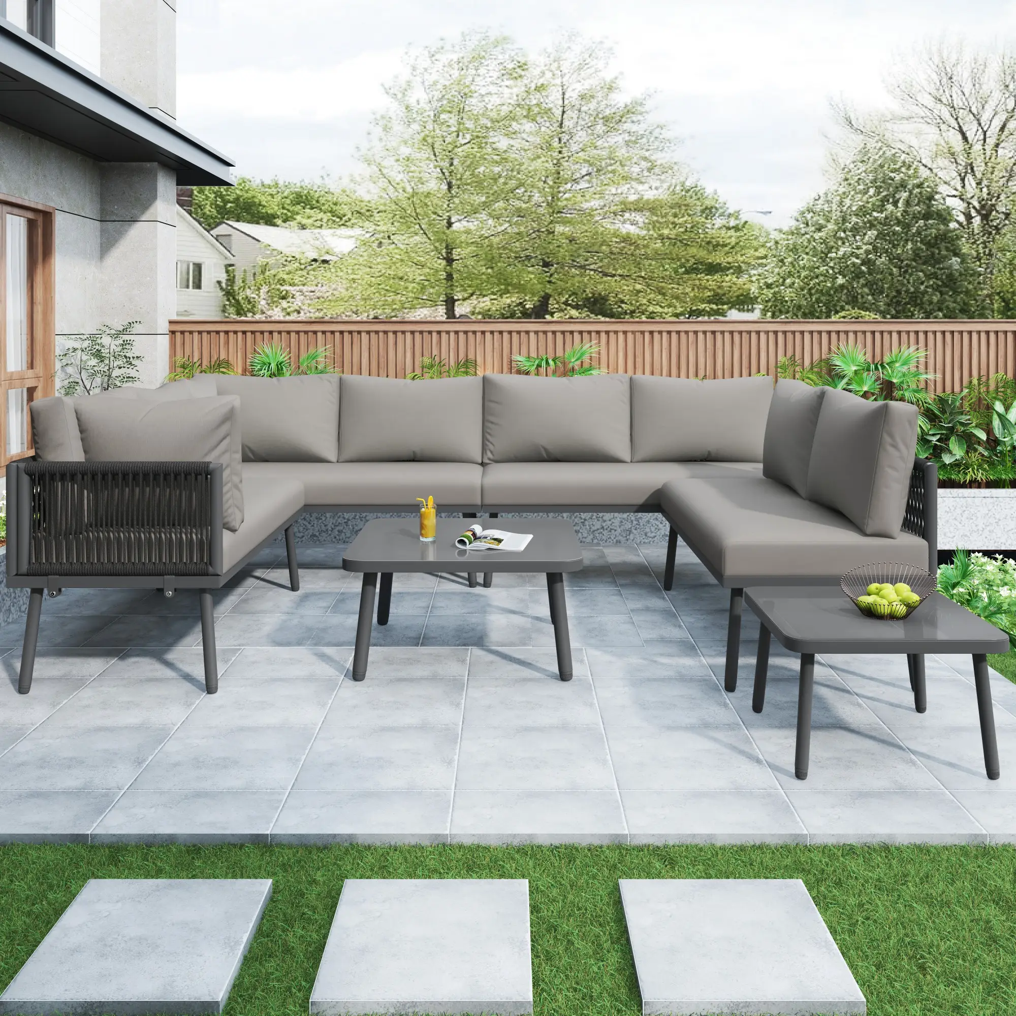 Ensemble de mobilier de jardin comprenant deux tables et quatre canapés deux places avec coussins, gris